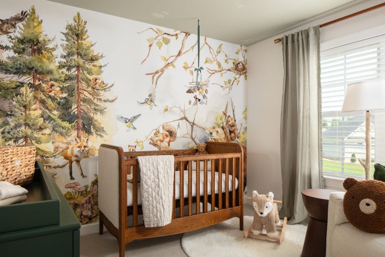 Sunny nursery with wall mural